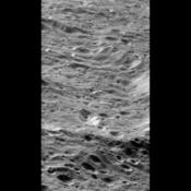 Cratered landscape on Rhea