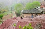 Manganese ore dump and village near Sishang, Shaanxi