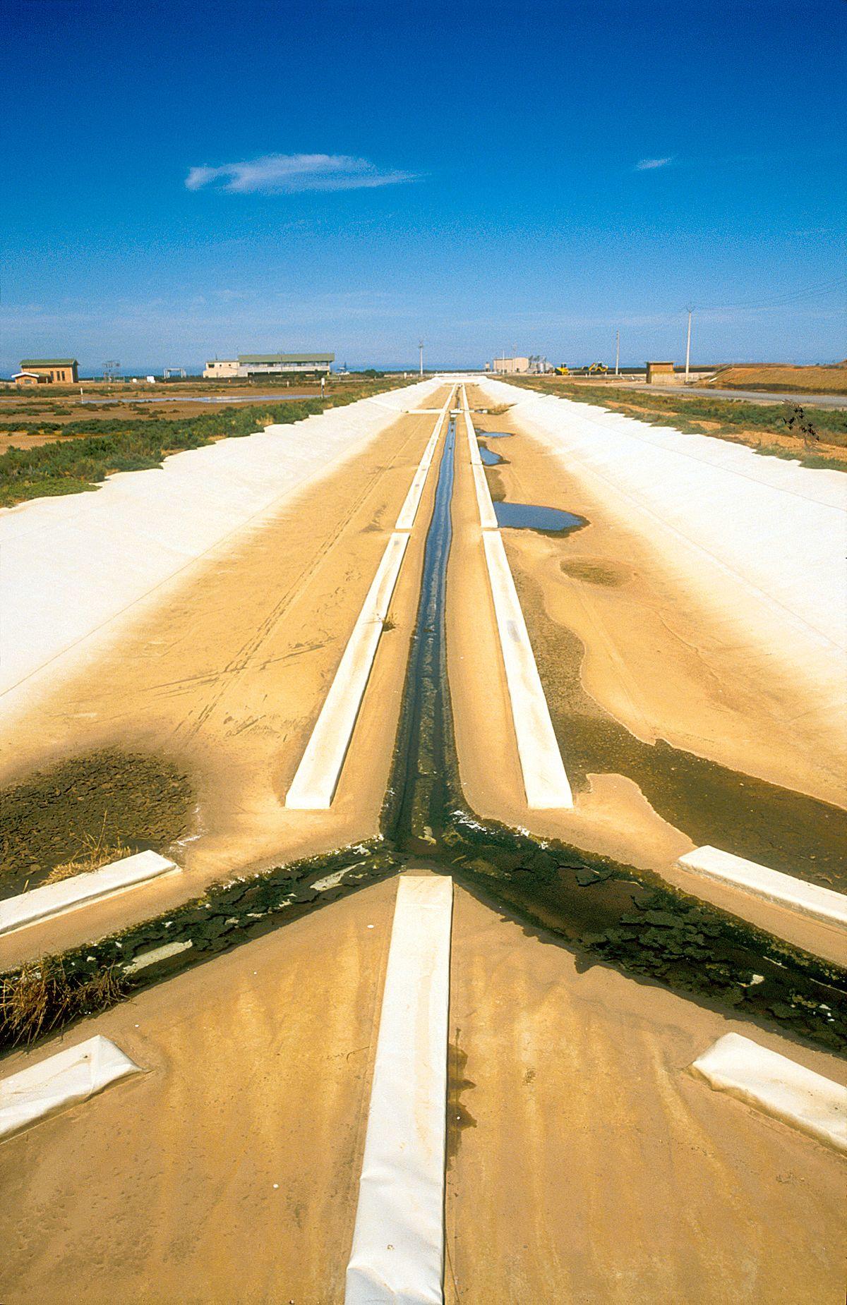 Outflow channels carry recycled effluent water from Bolivar Treatment Plant to pumping station for irrigation