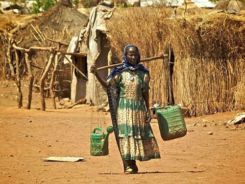 Kunama woman carrying water
