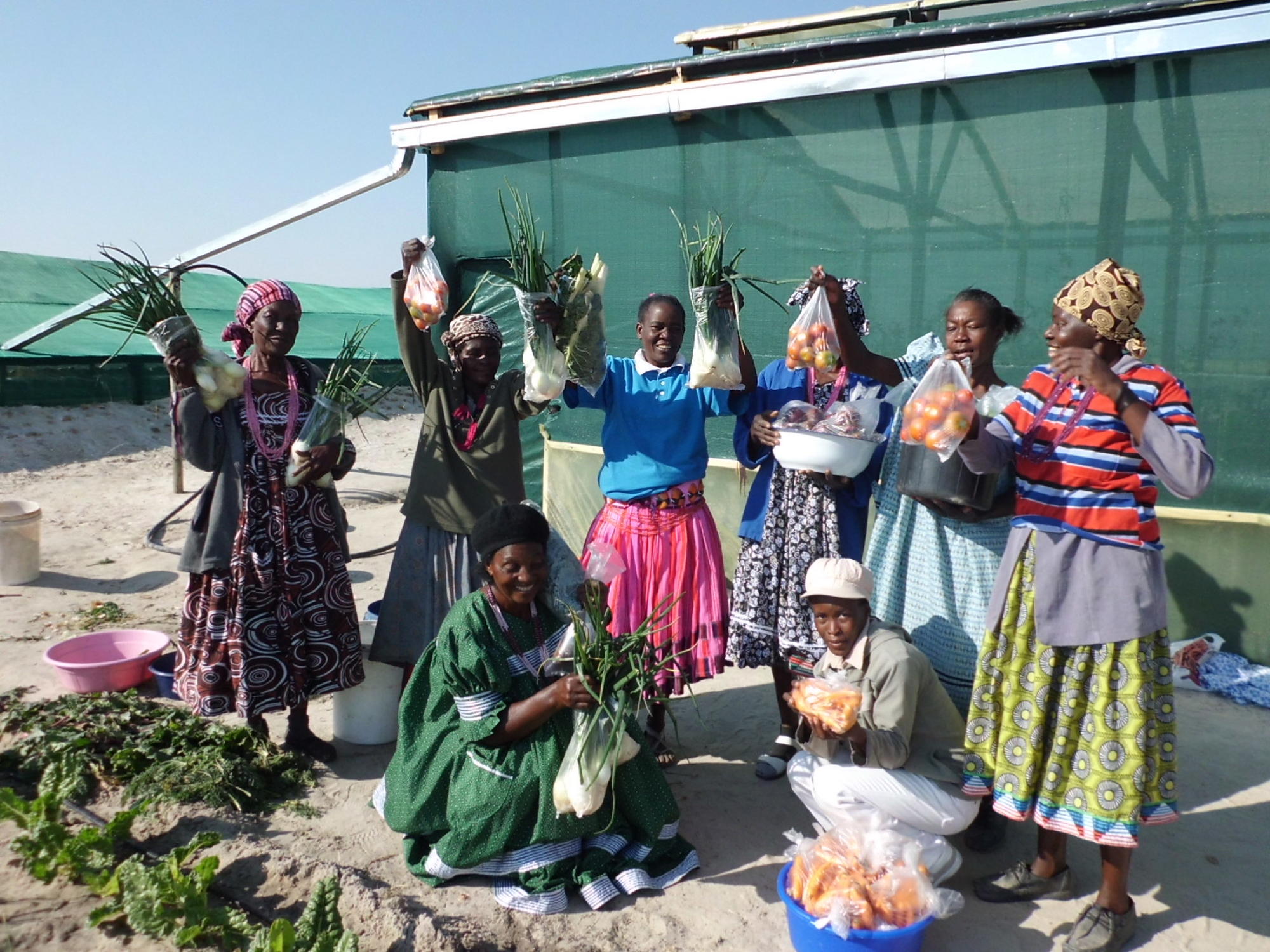 Farmers with the first harvest